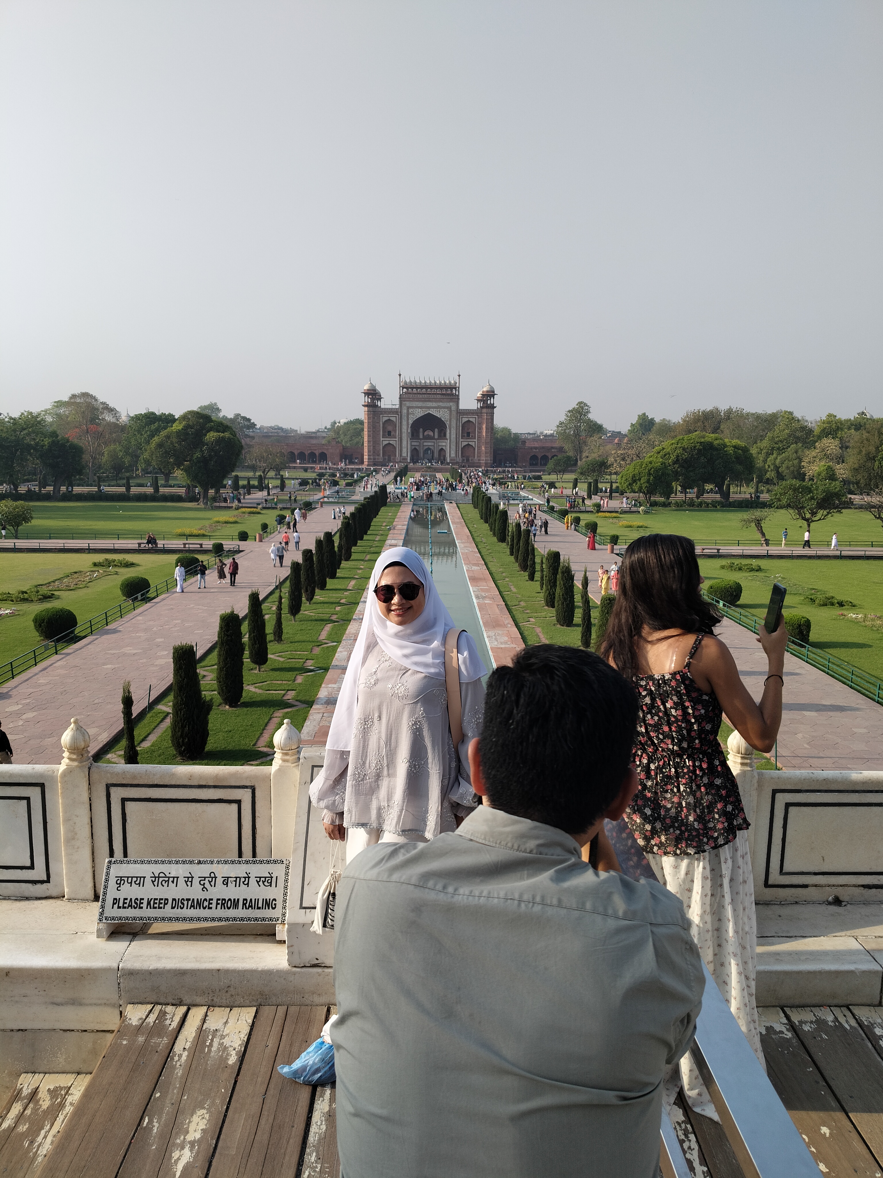 Mr. Verma with tourists smiling